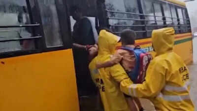 Watch: 6 children among 8 stuck in school bus on flooded Mumbai road; rescued | Mumbai News