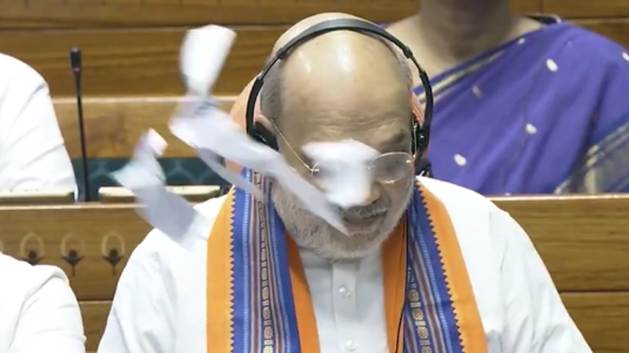 Monsoon session: Oppn MPs tear copies of three key bills; throw paper at Amit Shah | India News