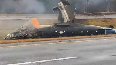 Watch: Small plane crashes onto Massachusetts highway, catches fire