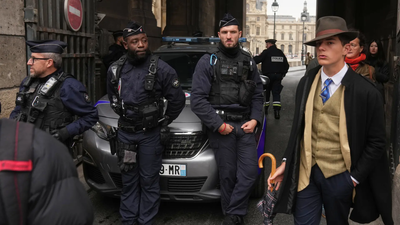 Fedora man unmasked: Meet the teen behind the Louvre mystery photo