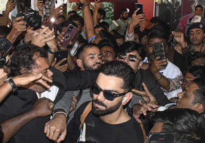 Scenes of frenzy: Virat Kohli gets mobbed on arrival in Vadodara – Watch | Cricket News