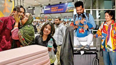 West Asia As Tensions Conflict: For families, reunions add colour to festivities at Delhi airport as stranded people return safely amid West Asia tensions | Delhi News